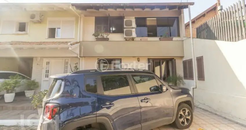 Casa em condomínio fechado com 3 quartos à venda na Avenida Juca Batista, 1490, Cavalhada, Porto Alegre