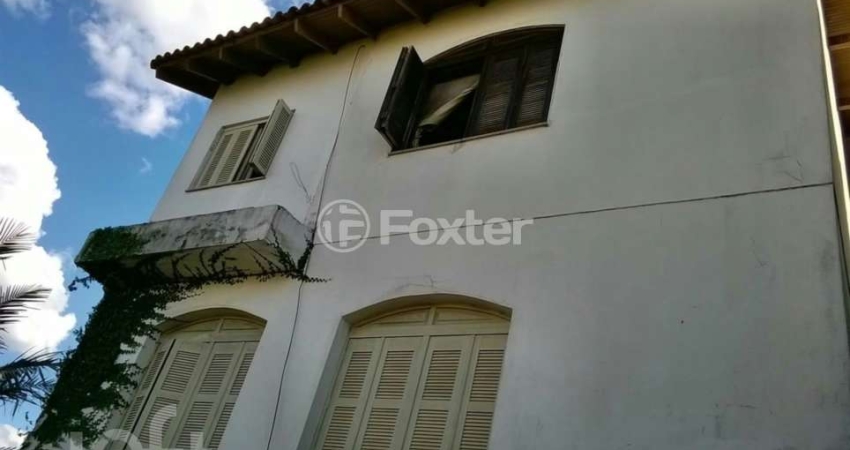 Casa com 2 quartos à venda na Rua Martim Minaberry, 432, Partenon, Porto Alegre