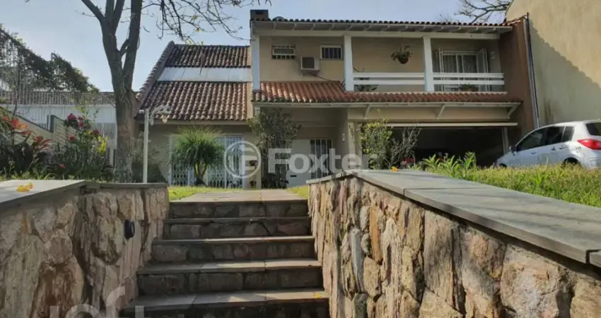 Casa com 4 quartos à venda na Travessa Pedra Redonda, 130, Jardim Isabel, Porto Alegre