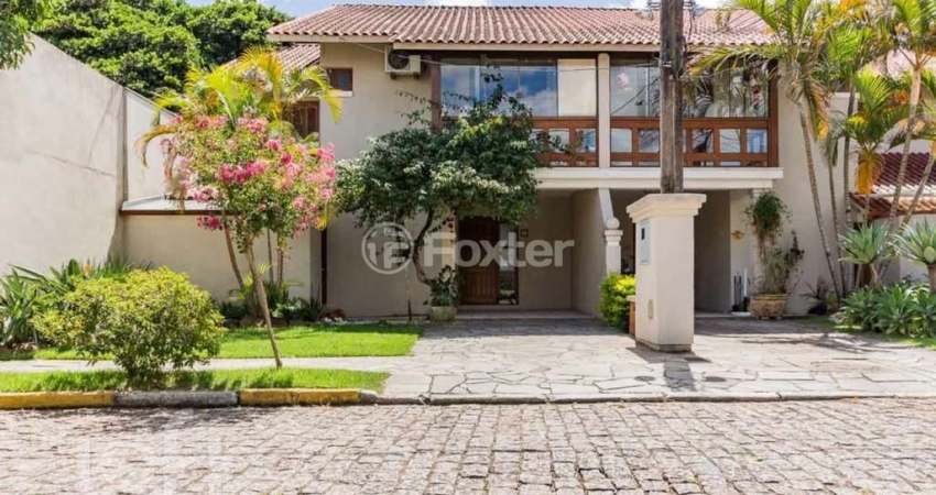 Casa em condomínio fechado com 3 quartos à venda na Avenida Eduardo Prado, 2050, Cavalhada, Porto Alegre