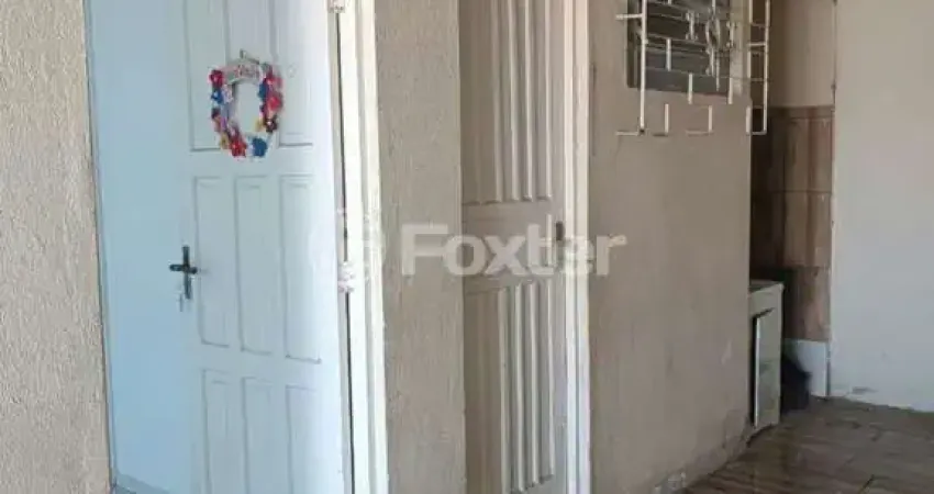 Casa com 3 quartos à venda na Rua Osvaldo Optiz, 595, Estância Velha, Canoas