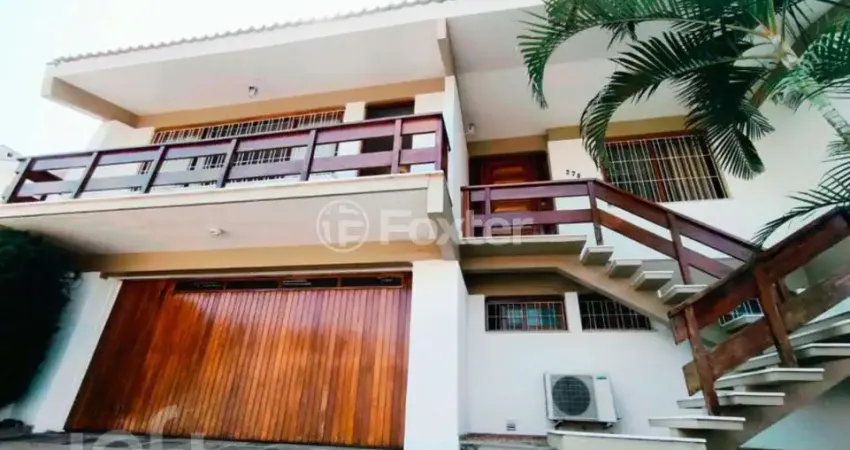 Casa com 3 quartos à venda na Rua Assunção, 275, Jardim Lindóia, Porto Alegre