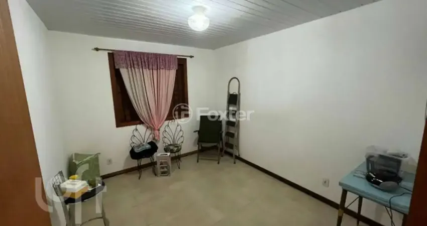 Casa com 2 quartos à venda na Rua Tenente Isolino Segobia, 58, Vila Nova, Porto Alegre