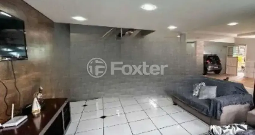 Casa com 4 quartos à venda na Rua Jerolomo Minuzo, 146, Vila Nova, Porto Alegre