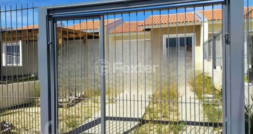 Casa com 2 quartos à venda na Rua Sete Mil e Quatorze, 102, Restinga, Porto Alegre