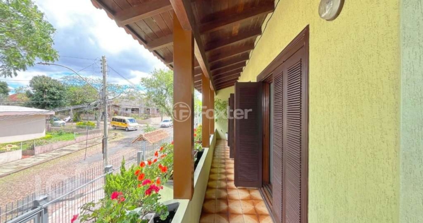Casa com 4 quartos à venda na Rua Professor José Maria Rodrigues, 58, Vila Ipiranga, Porto Alegre