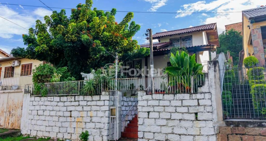 Casa com 2 quartos à venda na Rua Henrique Fraeb, 77, Partenon, Porto Alegre