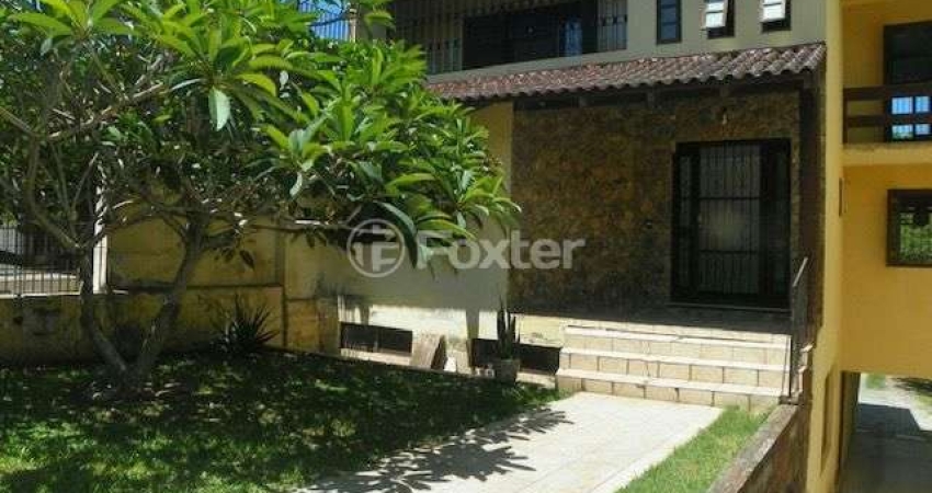 Casa com 4 quartos à venda na Rua Silvério Souto, 487, Teresópolis, Porto Alegre