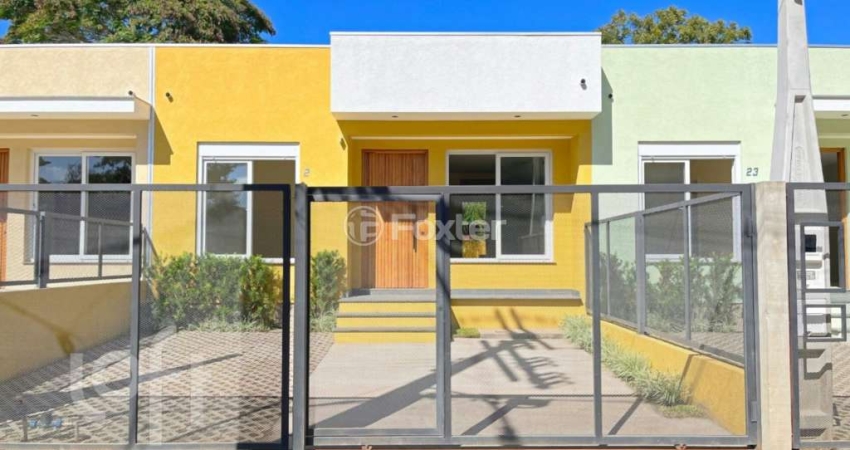 Casa com 3 quartos à venda na Rua Criciúma, 23, Guarujá, Porto Alegre