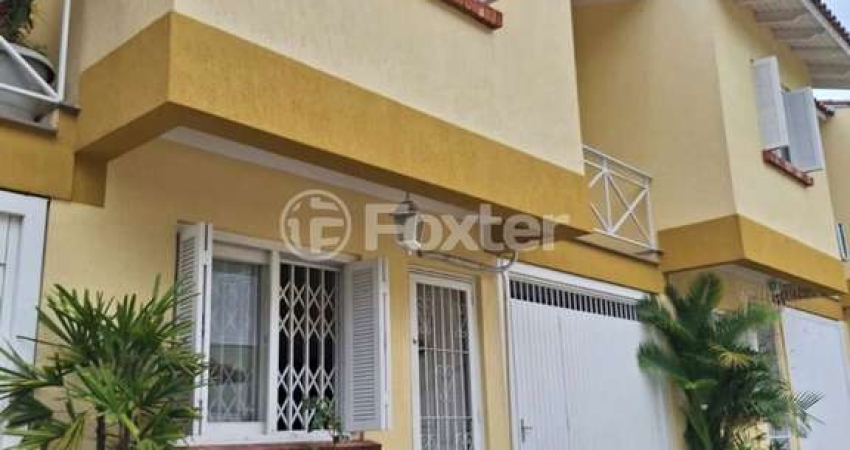 Casa em condomínio fechado com 3 quartos à venda na Rua Barbosa Neto, 205, Cavalhada, Porto Alegre