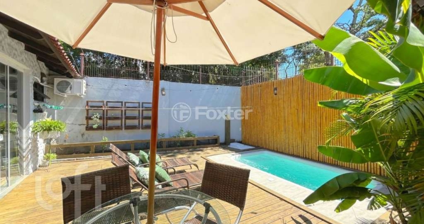 Casa com 4 quartos à venda na Rua Afonso Arinos, 625, Camaquã, Porto Alegre