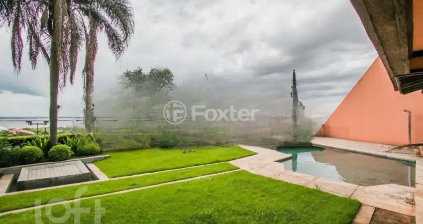Casa em condomínio fechado com 4 quartos à venda na Rua Gilberto Laste, 180, Santa Tereza, Porto Alegre