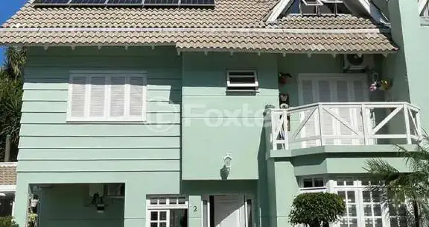 Casa em condomínio fechado com 4 quartos à venda na Rua Jacipuia, 275, Guarujá, Porto Alegre