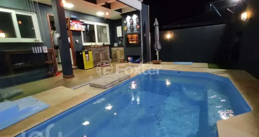 Casa em condomínio fechado com 3 quartos à venda na Rua Guatambu, 271, Hípica, Porto Alegre