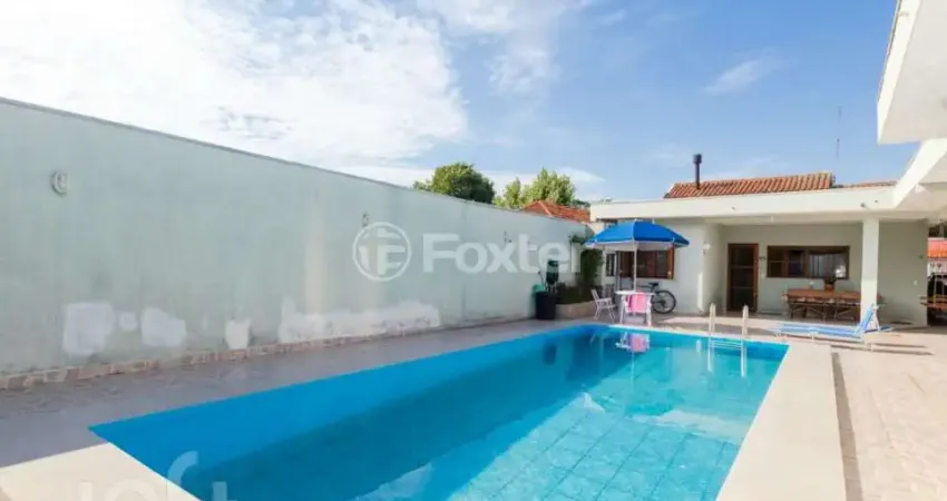 Casa com 4 quartos à venda na Rua Capiberibe, 106, Igara, Canoas