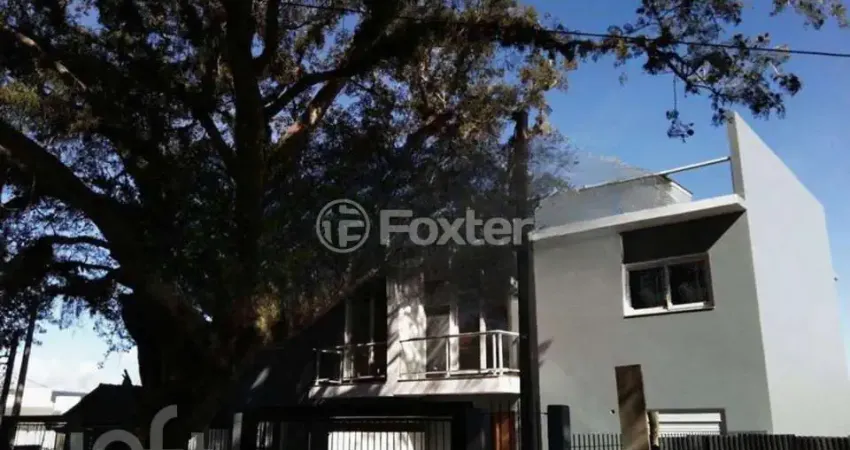 Casa com 3 quartos à venda na Rua Jacundá, 87, Guarujá, Porto Alegre