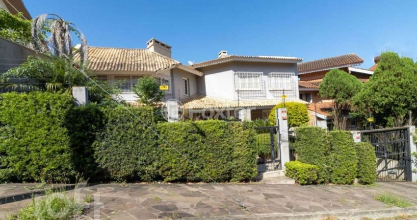 Casa com 4 quartos à venda na Rua José Otávio Manica, 80, Santa Tereza, Porto Alegre
