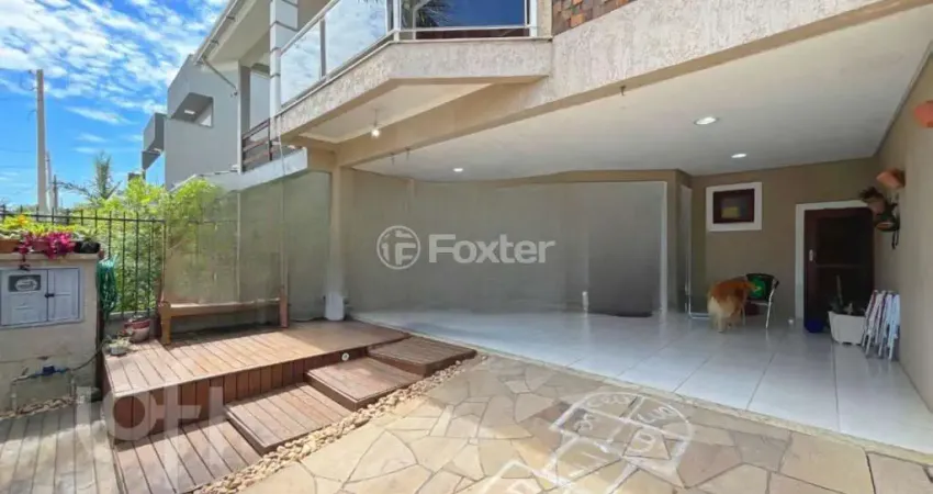 Casa com 3 quartos à venda na Rua Guatambu, 618, Hípica, Porto Alegre