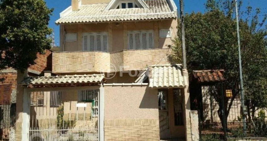 Casa com 4 quartos à venda na Rua Querubim Costa, 113, Coronel Aparício Borges, Porto Alegre