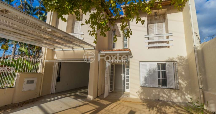 Casa com 3 quartos à venda na Rua dos Guenoas, 1100, Guarujá, Porto Alegre