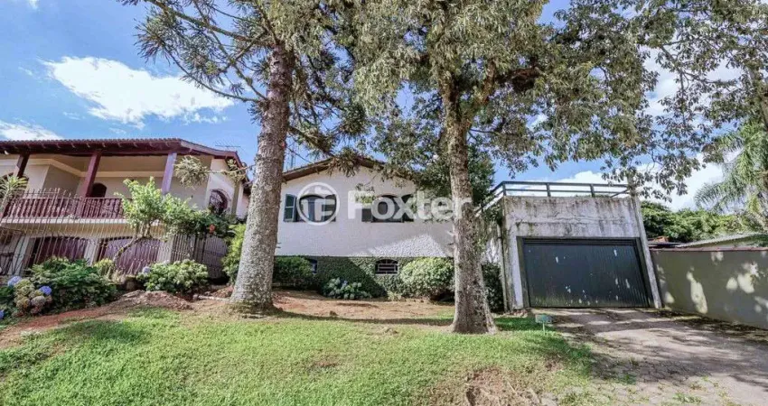 Casa com 3 quartos à venda na Rua Correio Rural, 172, Tarumã, Viamão