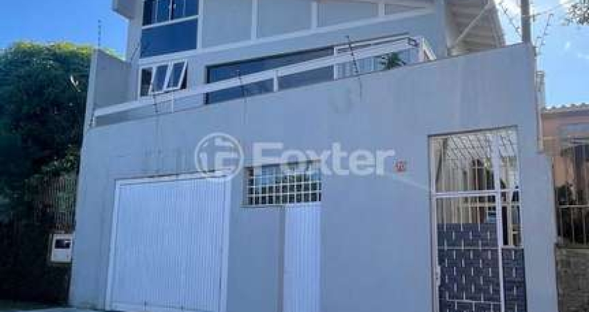 Casa com 3 quartos à venda na Rua João Corrêa Almeida, 70, Vila Nova, Porto Alegre