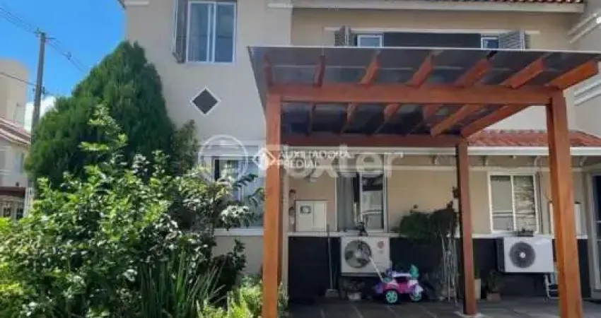 Casa em condomínio fechado com 3 quartos à venda na Avenida João Ferreira Jardim, 140, Parque Santa Fé, Porto Alegre