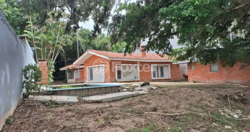 Casa com 4 quartos à venda na Rua Comissário Paulo Pires, 5462, Ponta Grossa, Porto Alegre