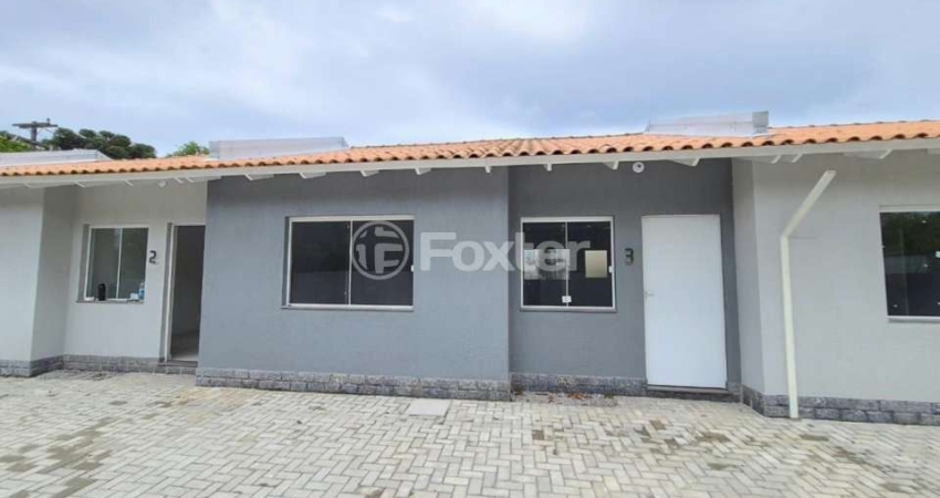 Casa em condomínio fechado com 2 quartos à venda na Rua Minuano, 844, Viamópolis, Viamão