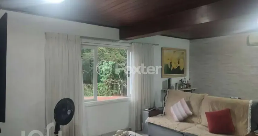 Casa com 4 quartos à venda na Avenida Guaíba, 4176, Vila Assunção, Porto Alegre