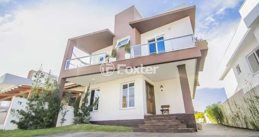 Casa em condomínio fechado com 3 quartos à venda na Avenida Edgar Pires de Castro, 540, Hípica, Porto Alegre