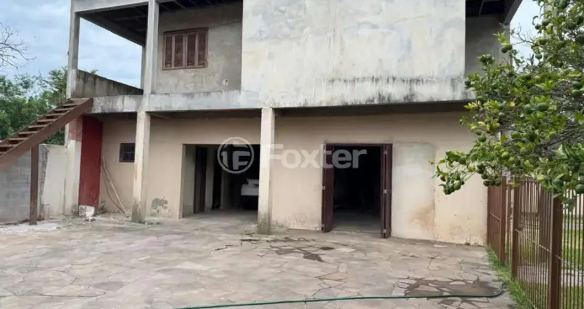 Casa com 4 quartos à venda na Rua Japeju, 39, Arquipélago, Porto Alegre