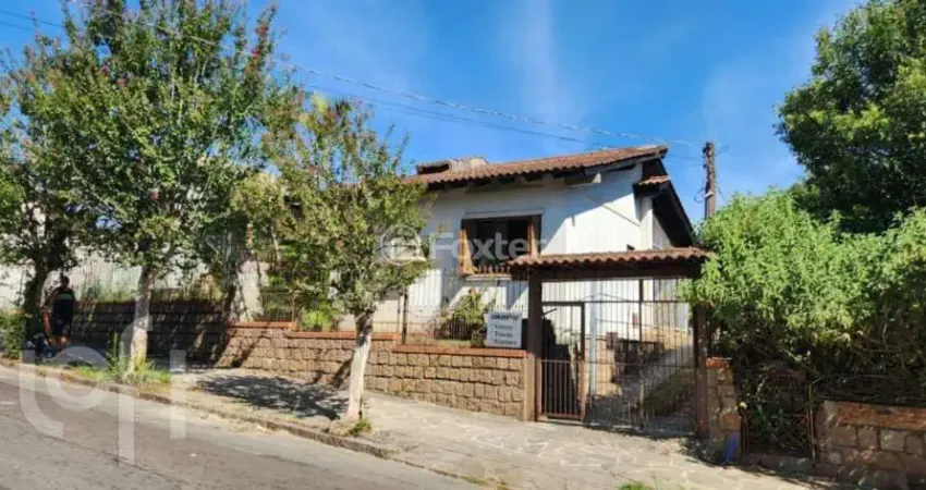 Casa com 3 quartos à venda na Rua Atílio Supertti, 287, Vila Nova, Porto Alegre