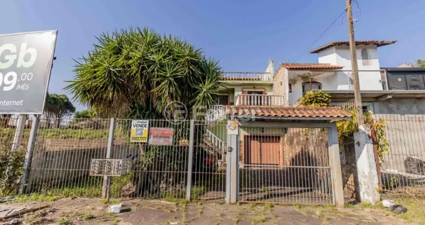 Casa com 3 quartos à venda na Avenida Tiradentes, 378, Aparecida, Alvorada