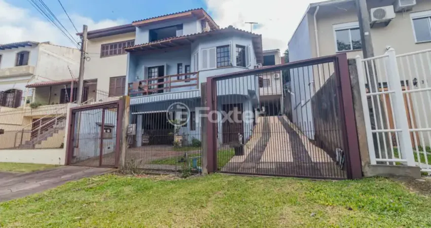 Casa com 5 quartos à venda na Rua Nero José da Silva Filho, 185, Partenon, Porto Alegre