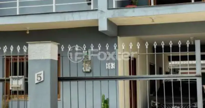 Casa com 3 quartos à venda na Rua Moroty Baldwin Michel, 5, Rubem Berta, Porto Alegre