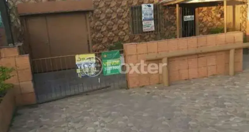 Casa com 3 quartos à venda na Avenida Edgar Pires de Castro, 3190, Restinga, Porto Alegre