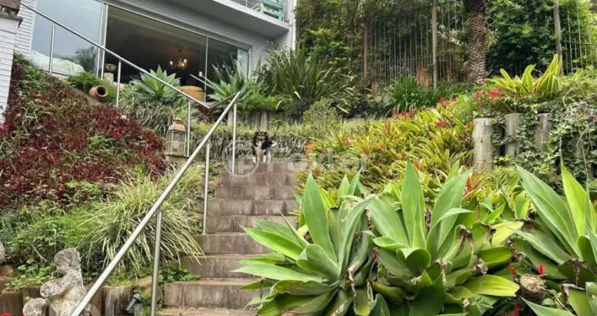 Casa com 3 quartos à venda na Rua Edgar Luiz Schneider, 480, Jardim Isabel, Porto Alegre