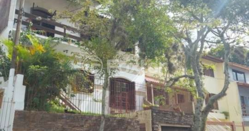 Casa com 4 quartos à venda na Rua Nero José da Silva Filho, 205, Partenon, Porto Alegre
