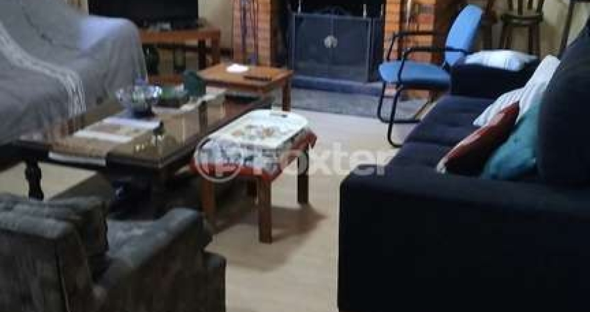 Casa com 4 quartos à venda na Rua Padre João Batista Reus, 875, Vila Conceição, Porto Alegre