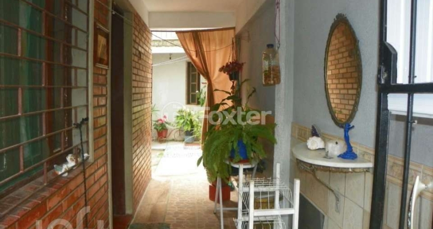 Casa com 3 quartos à venda na Avenida Monte Cristo, 515, Vila Nova, Porto Alegre