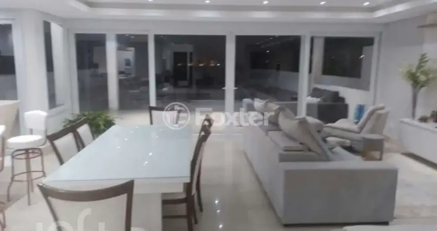 Casa em condomínio fechado com 5 quartos à venda na Avenida Juca Batista, 8000, Chapéu do Sol, Porto Alegre