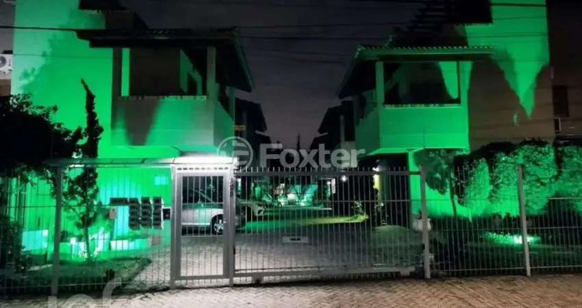 Casa em condomínio fechado com 2 quartos à venda na Avenida Guarujá, 126, Guarujá, Porto Alegre