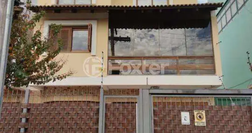 Casa com 3 quartos à venda na Rua José Aristides Martins, 43, Ipanema, Porto Alegre