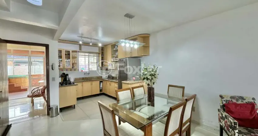 Casa com 3 quartos à venda na Rua Raymundo Luiz Marinho Filho, 299, Parque Santa Fé, Porto Alegre