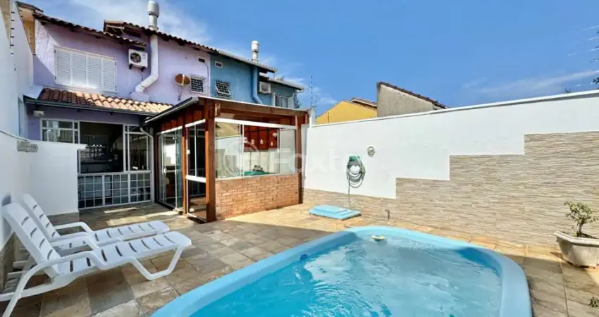 Casa com 3 quartos à venda na Rua Raymundo Luiz Marinho Filho, 299, Parque Santa Fé, Porto Alegre