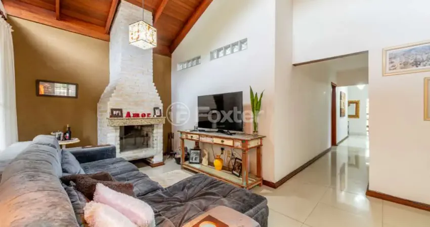 Casa comercial com 3 salas à venda na Rua Sílvio Silveira Soares, 2385, Camaquã, Porto Alegre