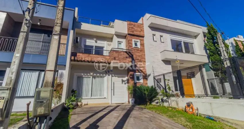 Casa em condomínio fechado com 3 quartos à venda na Rua Roberto Santini, 124, Hípica, Porto Alegre