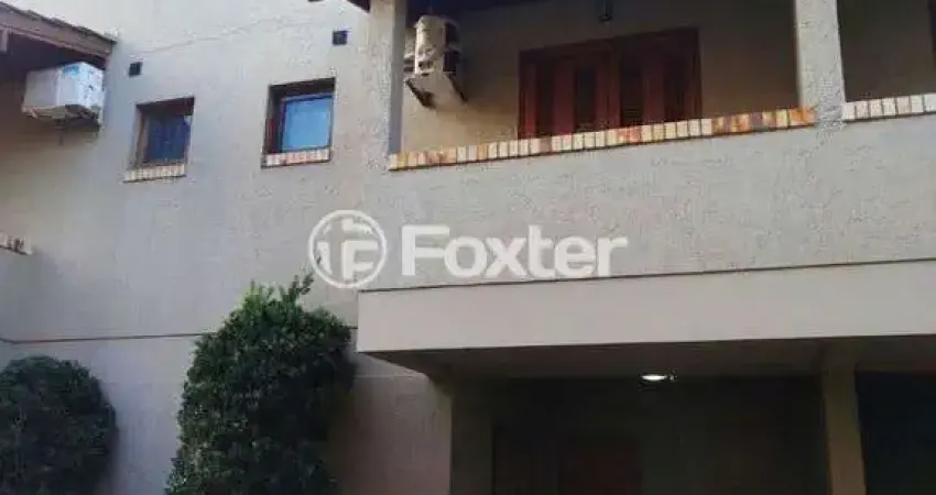 Casa em condomínio fechado com 2 quartos à venda na Avenida Guarujá, 126, Guarujá, Porto Alegre