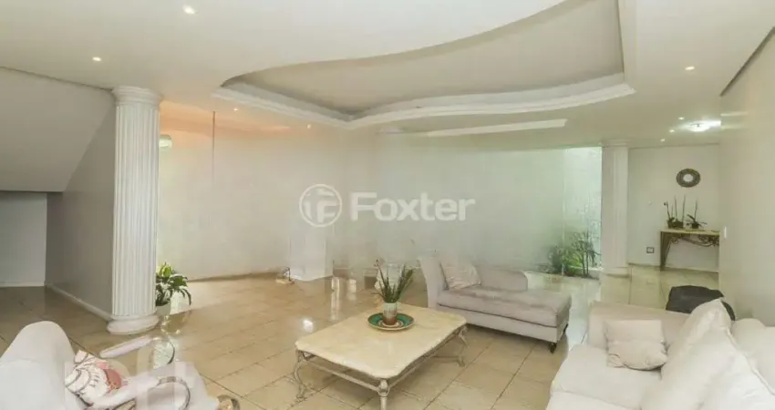 Casa com 5 quartos à venda na Rua Theonila Carvalho da Motta, 184, Parque Santa Fé, Porto Alegre